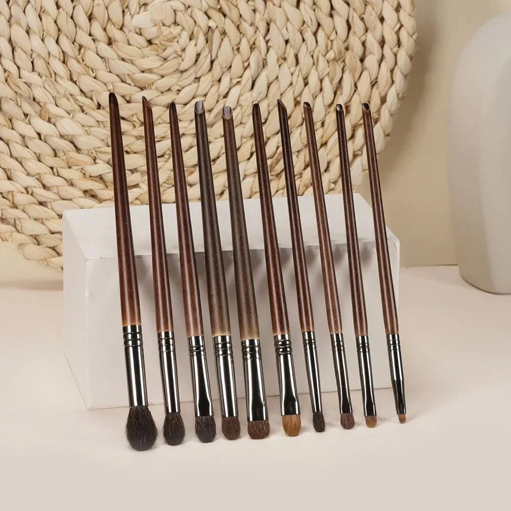 A set of 10 high-quality eye makeup brushes in various shapes and sizes, perfect for blending, shading, and defining the eyes