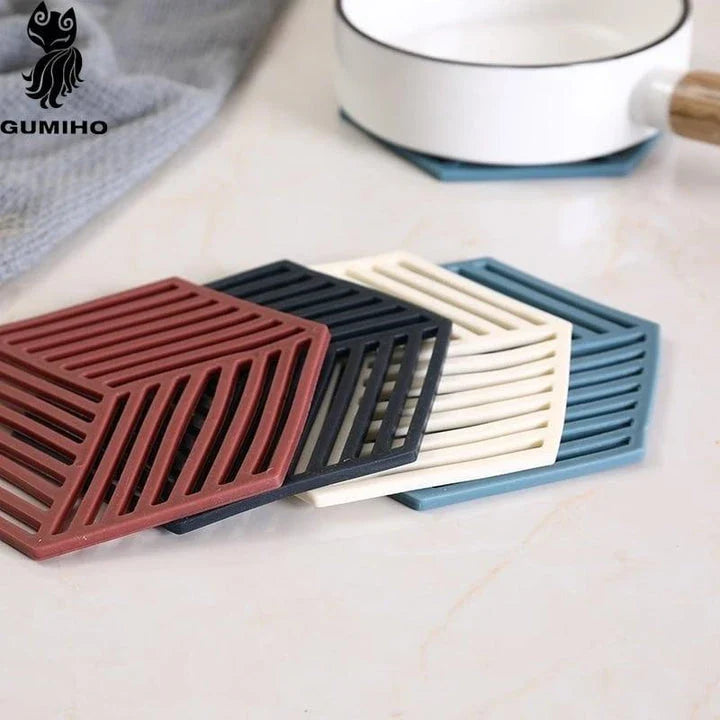 Geometric pattern cup coasters in a minimalist British design, made from durable rubber to protect surfaces