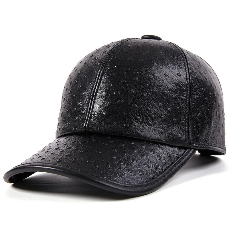 A stylish men's baseball cap made from warm, first-layer cowhide leather with an eye-catching ostrich pattern design.