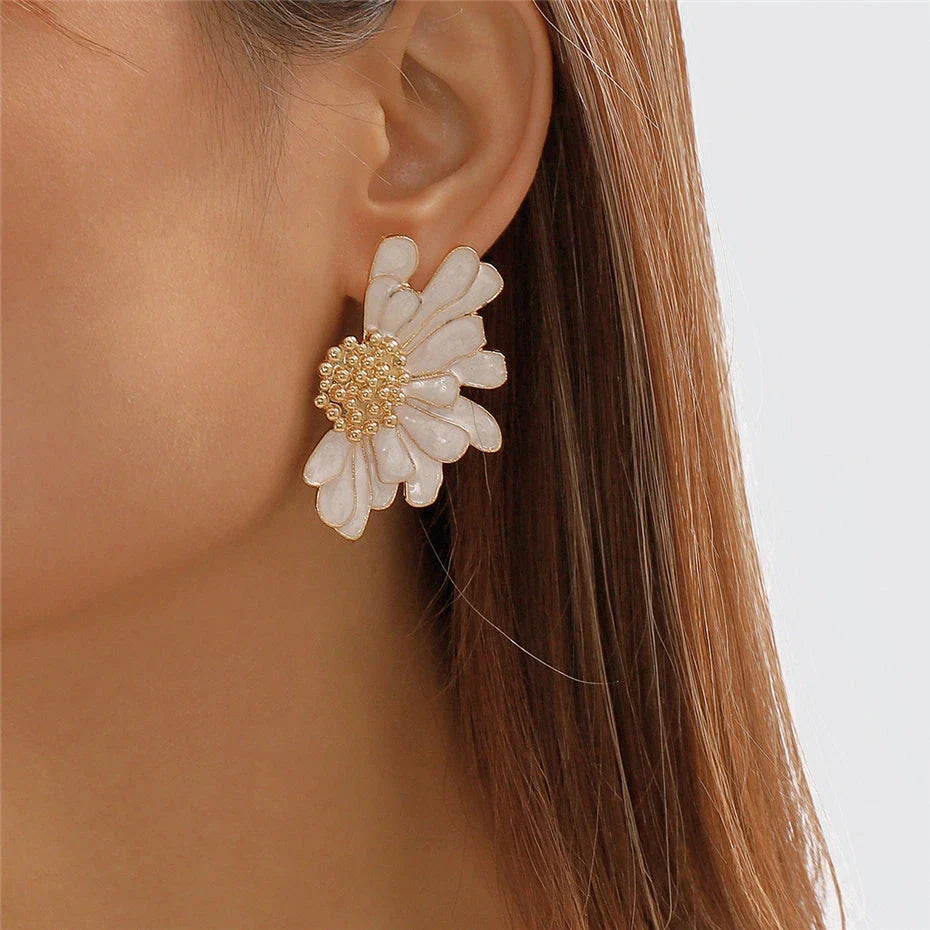 Vibrant, multi-coloured floral petal stud earrings with a blend of bohemian and modern influences