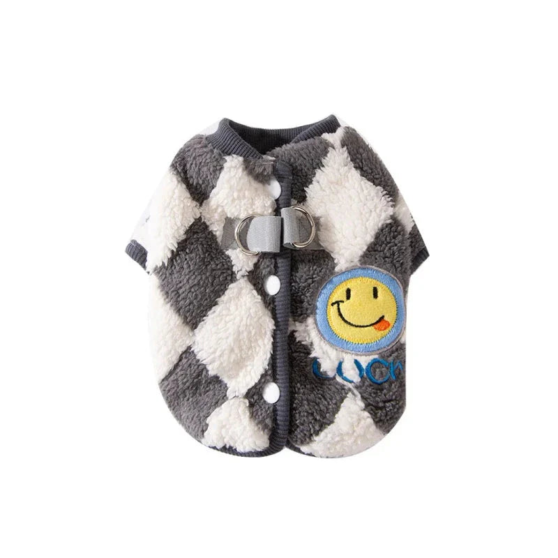A stylish checkered fleece coat for small and medium-sized dogs, providing warmth and comfort during the chilly British autumn and winter seasons.