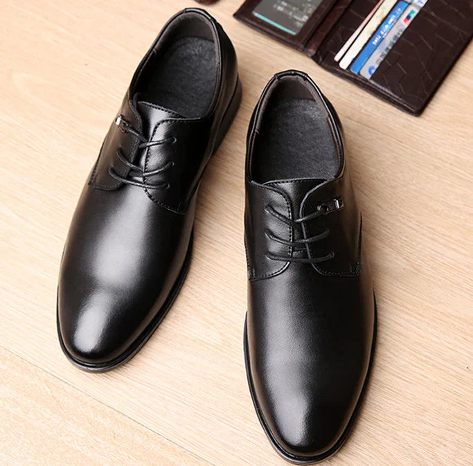 Stylish and comfortable black casual loafers made from breathable microfibre leather for the modern UK man