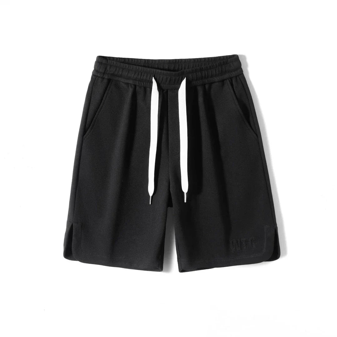 Premium British-made knitted sports shorts in a variety of classic colours, featuring an elastic waistband and loose, comfortable fit.