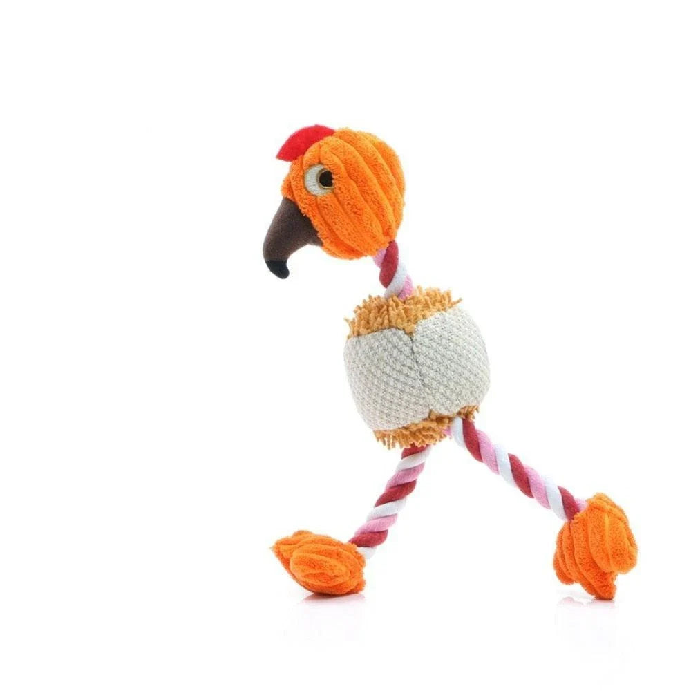 A plush, bird-shaped dog toy in a pink colour. It is designed to encourage chewing and snuggling behaviour in dogs.