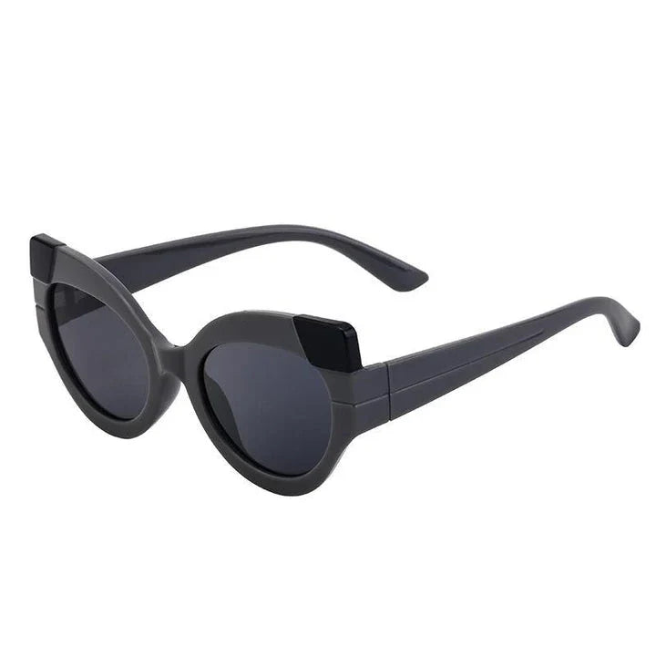 Iconic Cat Eye Retro Punk Sunglasses in black and gray, offering vintage charm and modern edge with UV400 protection