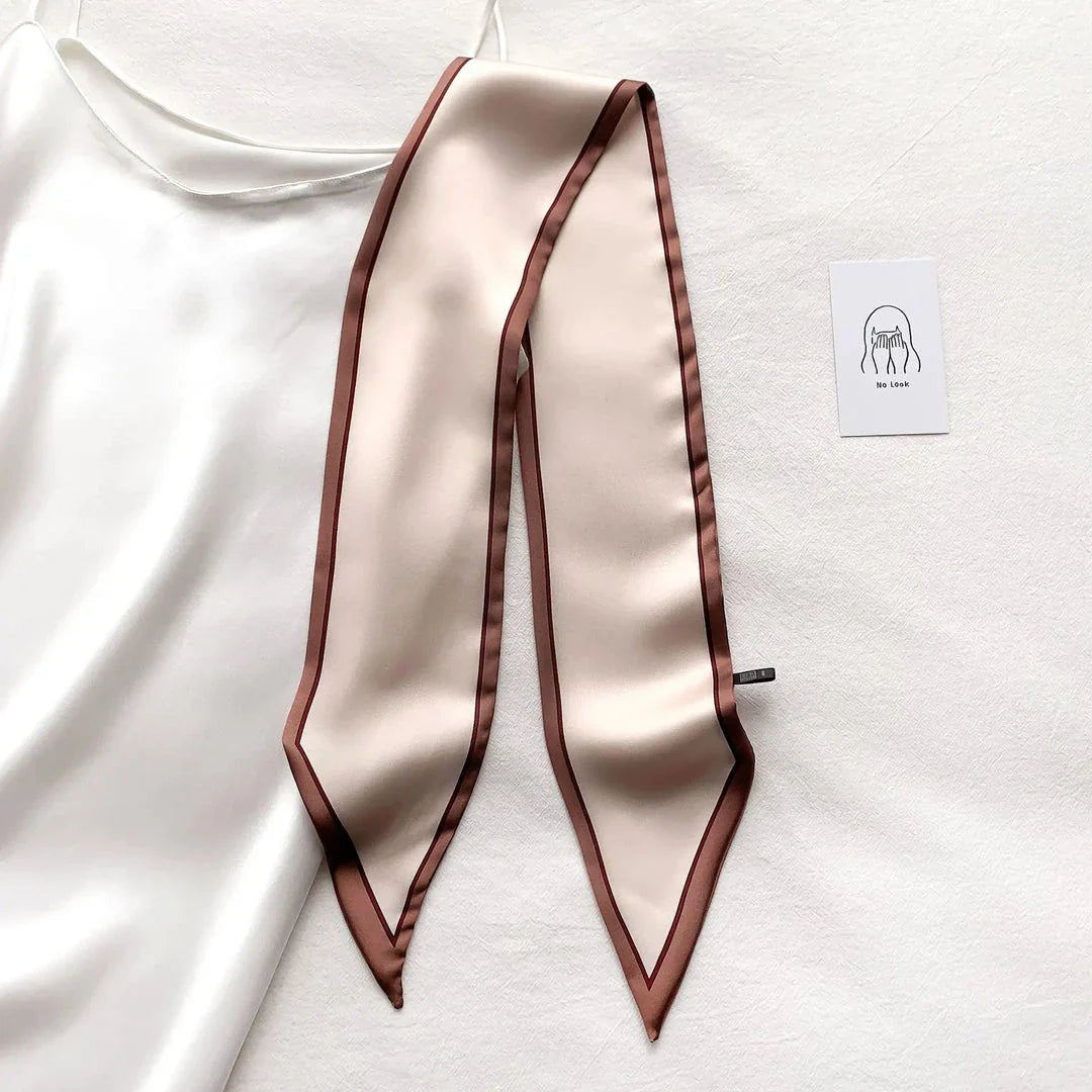Luxury silk-feel narrow scarf in blue colour, a versatile fashion accessory for the modern British woman
