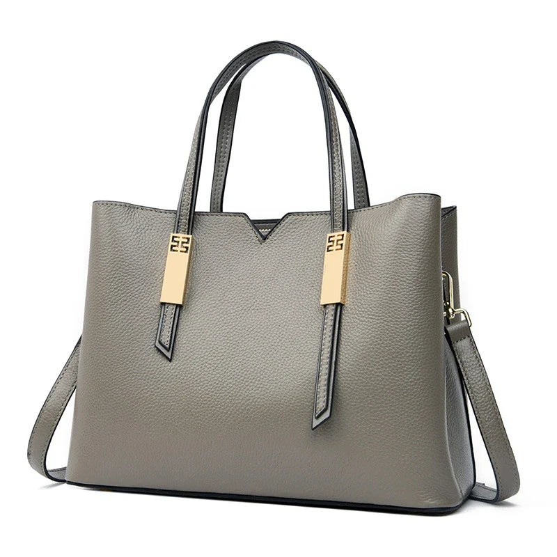 Premium cowhide crossbody handbag in various colour options, featuring a stylish and versatile design for discerning middle-aged shoppers