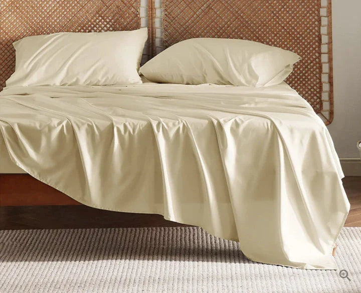 Bamboo fibre bedding set with fitted sheet, pillowcases, and solid colour design