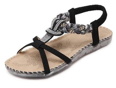 Stylish low-top toe sandals with two-layer leather upper, raw rubber sole, and rhinestone embellishments for chic British fashion