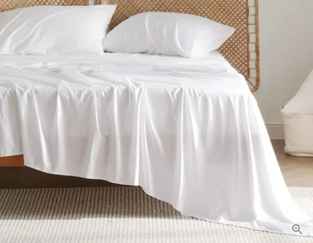 Bamboo fibre bedding set with fitted sheet, pillowcases, and solid colour design