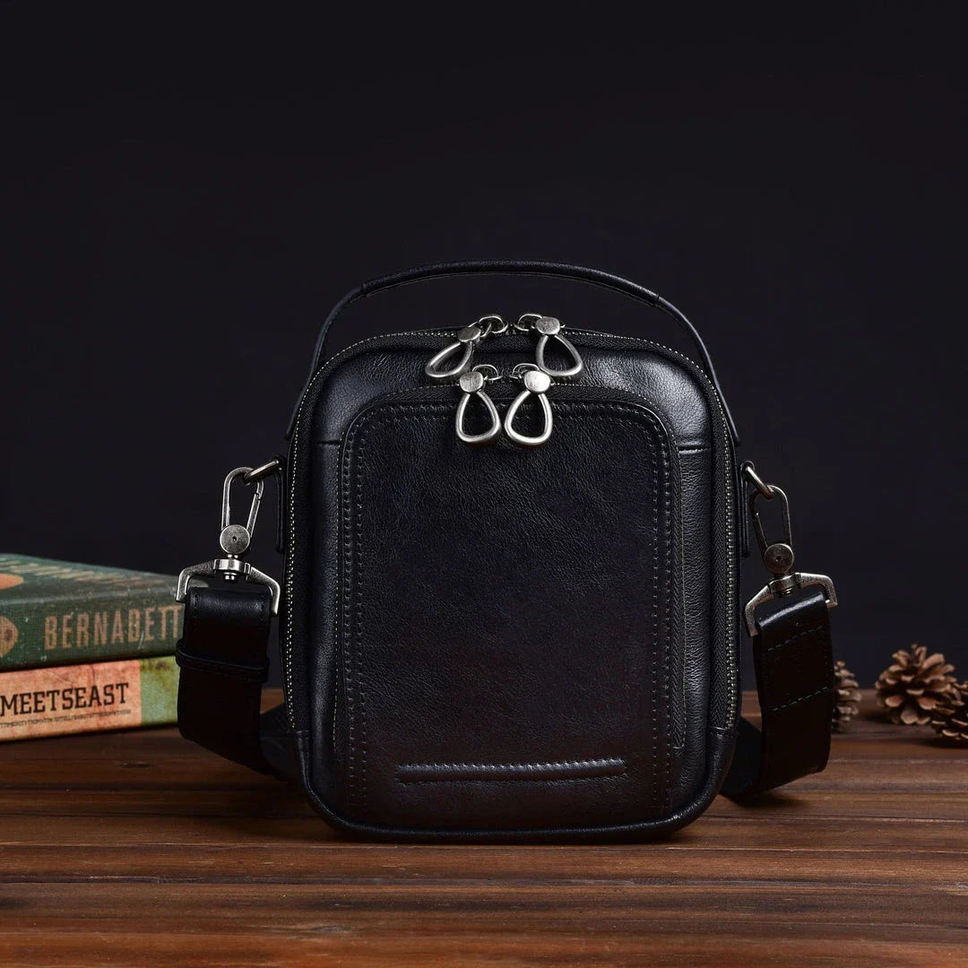 Premium retro leather messenger bag with spacious main compartment, side pockets, and robust handle for comfortable carrying
