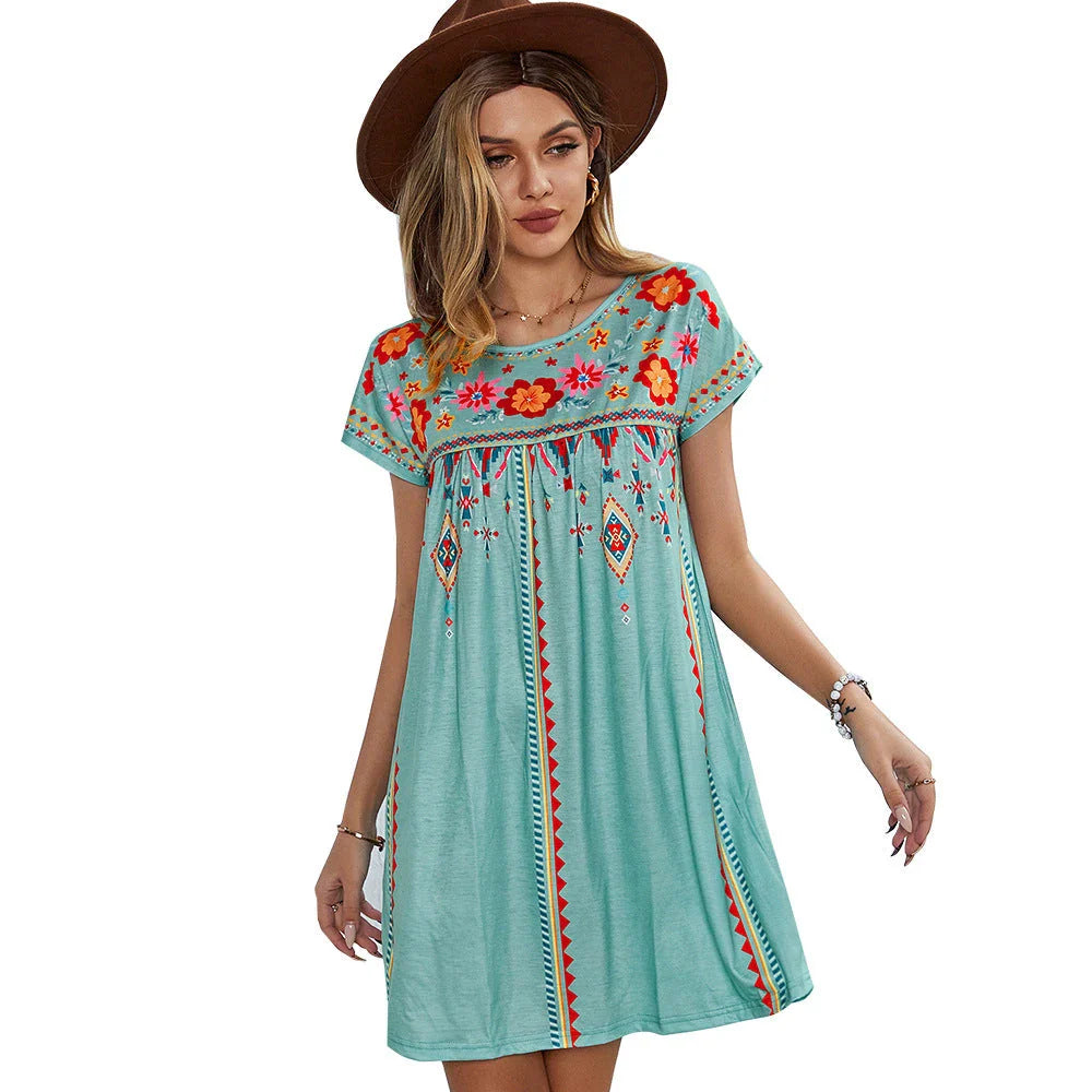 A stylish bohemian-inspired short dress with a geometric pattern, A-line silhouette, and short sleeves, suitable for warm weather