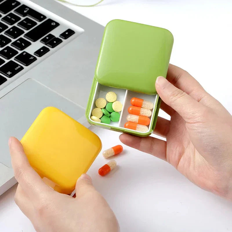 Compact and portable 2-grid mini pill box made of durable ABS plastic for organised medication storage