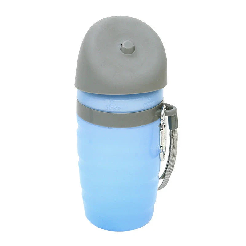 Portable dog water bottle with foldable drinking cup bowl, made of durable and food-grade plastic for safe hydration on walks, hikes, and outdoor activities.