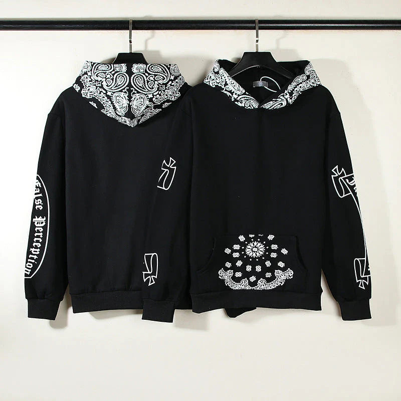 A cosy, fleece-lined hoodie with a classic paisley pattern, a relaxed fit, and practical side pockets for easy style and comfort.