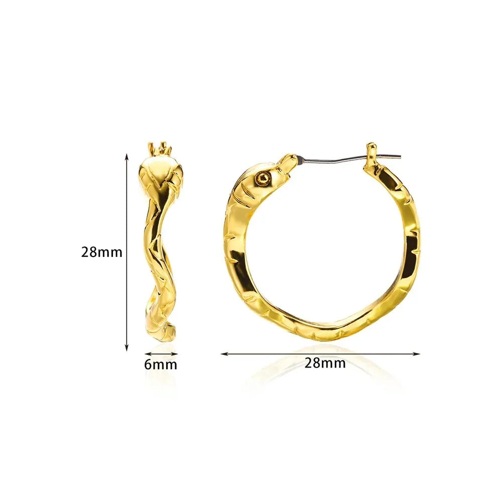 A pair of gold-toned stainless steel hoop earrings, showcasing a classic and sophisticated design