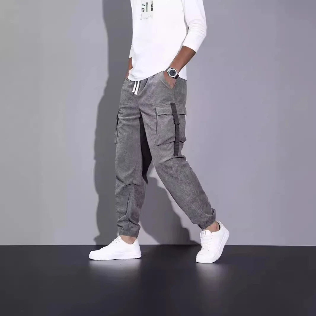 Premium British-inspired corduroy overalls with a relaxed, ankle-tied silhouette and stretchy, breathable fabric for all-day comfort and style.