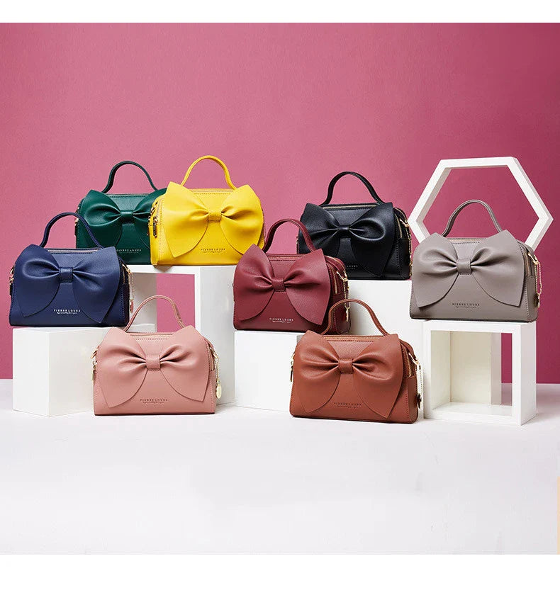 Elegant brown Korean-inspired bow shoulder bag with adjustable strap and roomy interior