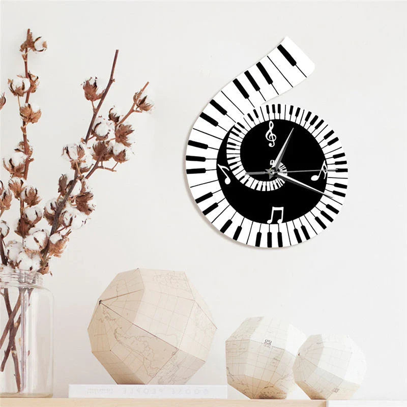 Decorative wall clock with treble clef and piano keyboard design in black and white