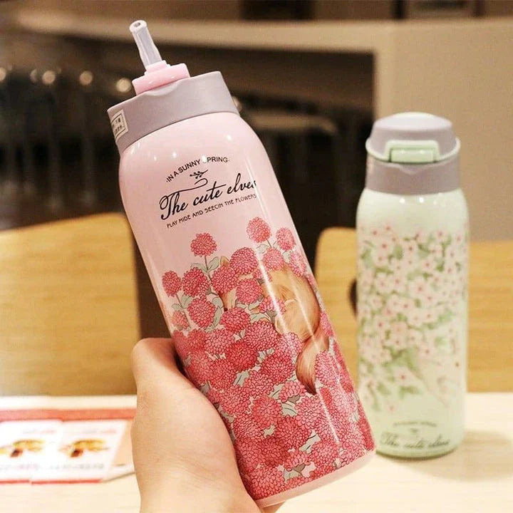 Stylish floral double-wall insulated water bottle with straw, made of high-quality stainless steel for long-lasting use and temperature control.
