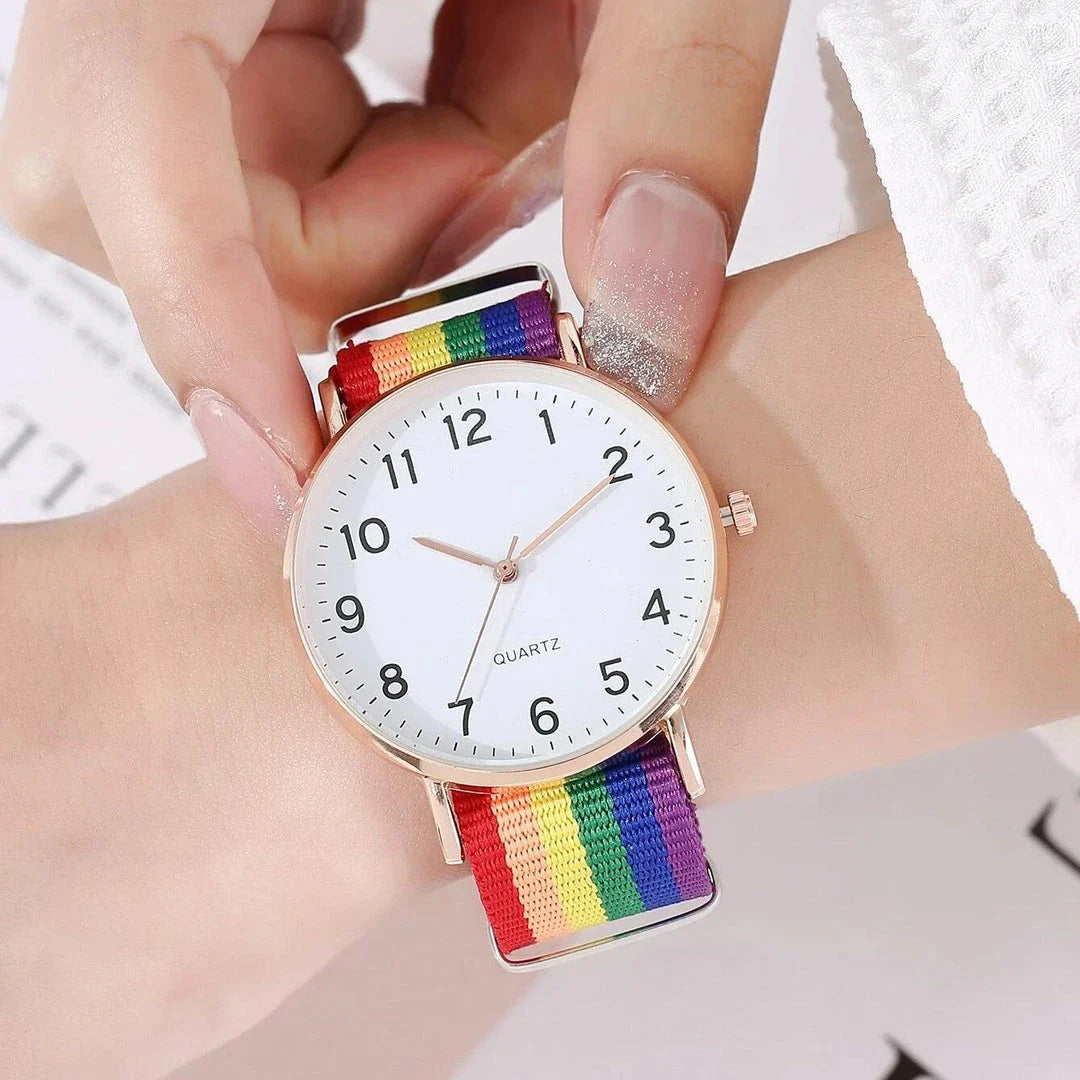 A stylish rainbow-coloured women's wristwatch with a quartz movement and an alloy case for elegant and durable design.