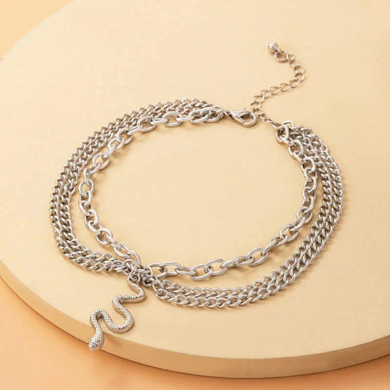 A stylish gold boho anklet with delightful tassels, starfish, and heart charms, perfect for summer outings and everyday wear.