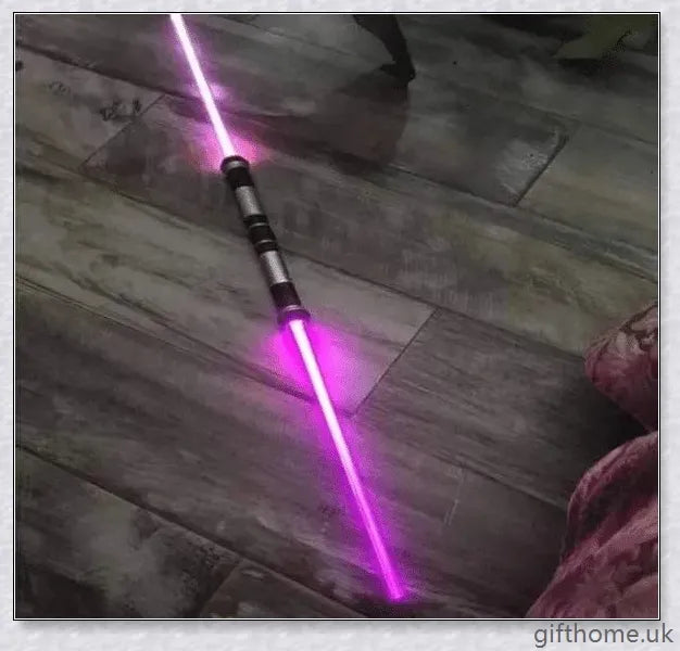 Premium dual-bladed lightsaber with sleek silver hilt, vibrant light modes, and sound effects for authentic Star Wars gameplay