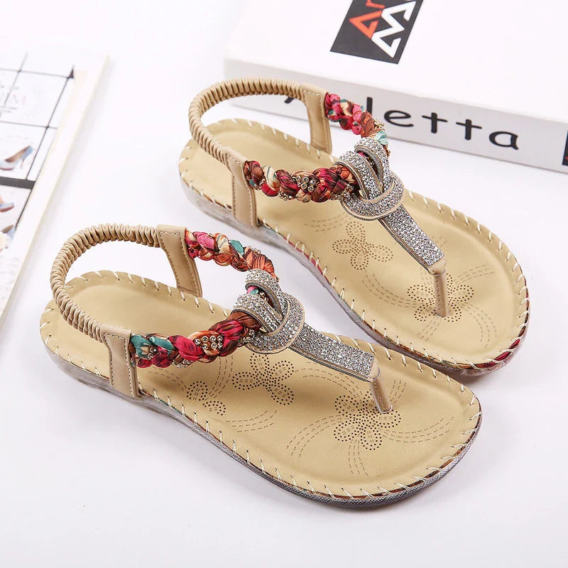 Stylish low-top toe sandals with two-layer leather upper, raw rubber sole, and rhinestone embellishments for chic British fashion