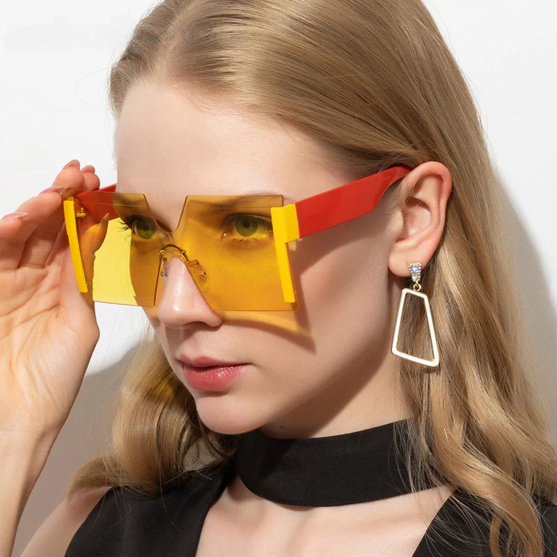 Stylish rimless gradient square sunglasses for women, featuring a bold and versatile design with gradient lenses for enhanced privacy and sun protection.