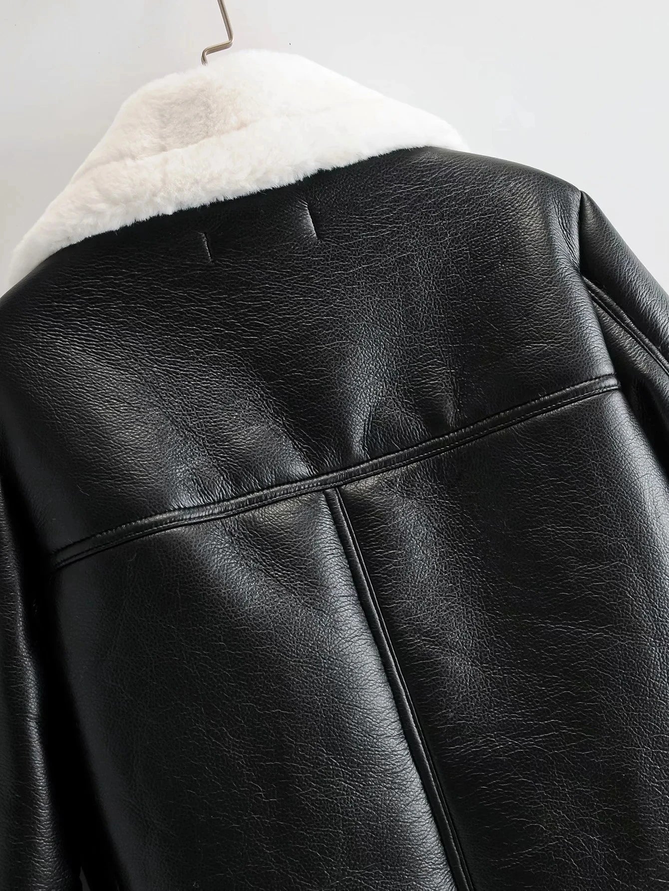 Warm faux leather jacket with plush faux fur lining, available in classic British colours for autumn and winter wear.