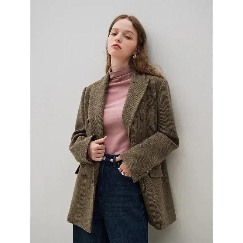Sophisticated wool blazer and skirt set for professional women, featuring a chic double-breasted jacket and an elegant long skirt with a stylish front split