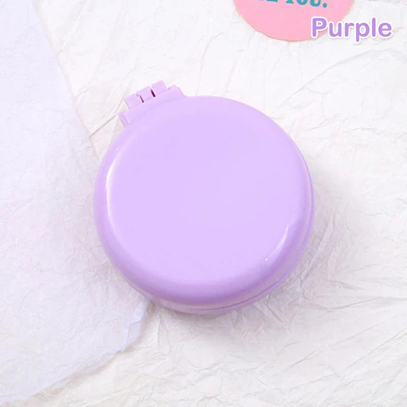 Compact folding hair comb with mirror, perfect for on-the-go touch-ups and styling for British customers