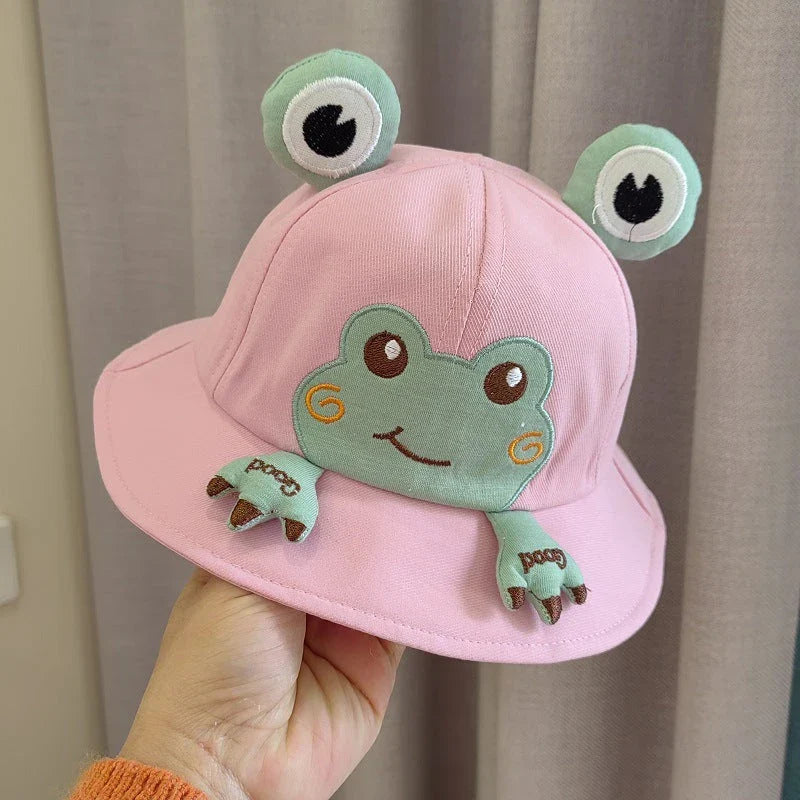 Charming frog-themed baby sun hat made from soft, breathable cotton with UPF 50+ sun protection