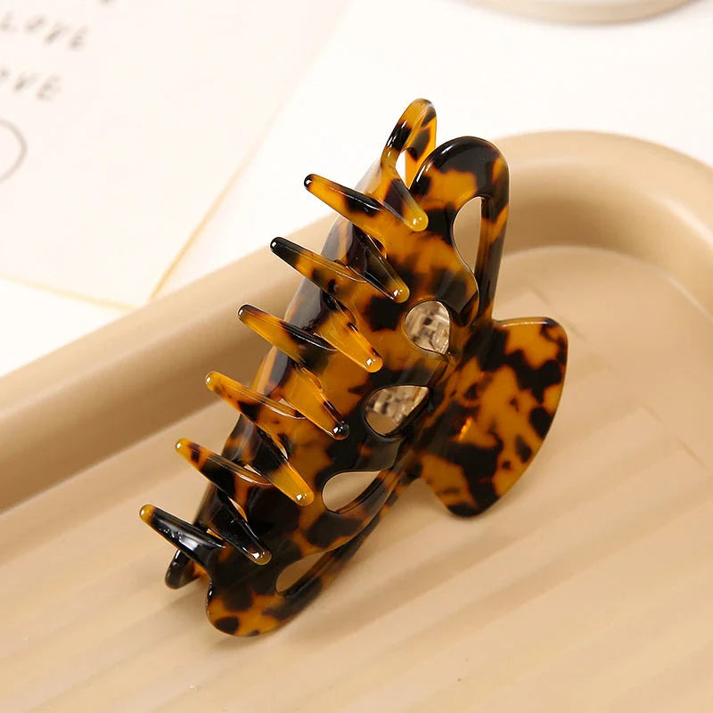 Chic geometric hollow stripes hair barrettes in beige colour, made from premium acetate for durable and comfortable wear