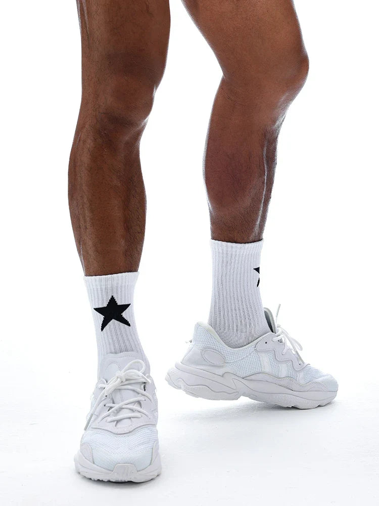 Premium white sports socks with a five-pointed star pattern, designed for men's active lifestyles.