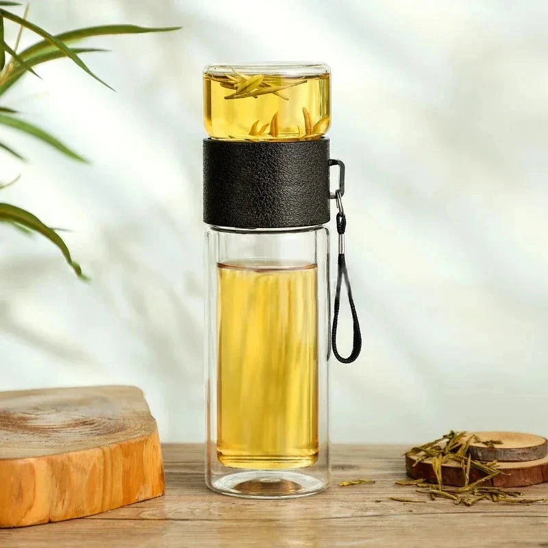 Elegant 400ml double-walled glass tea infuser bottle with wooden accent, perfect for brewing loose leaf tea or infusing water