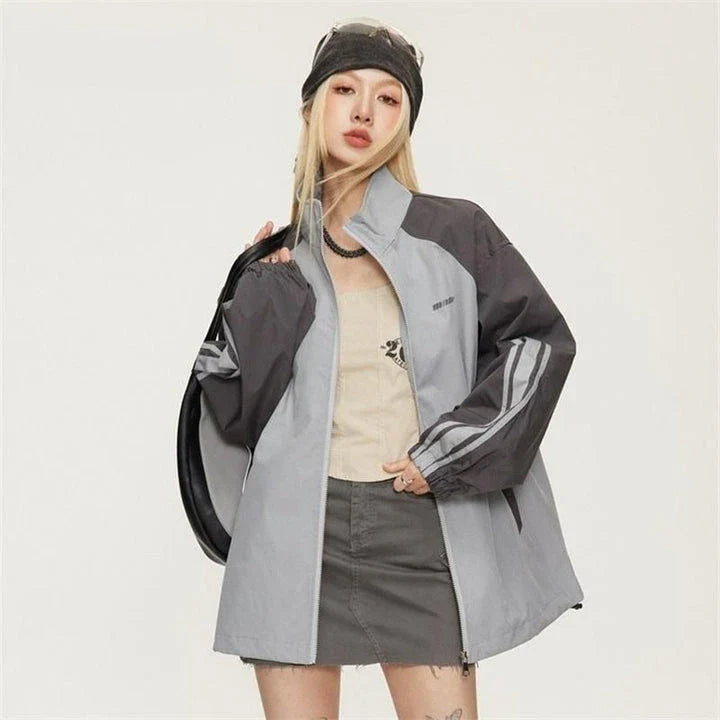 A stylish autumn-winter striped bomber jacket with lantern sleeves for women