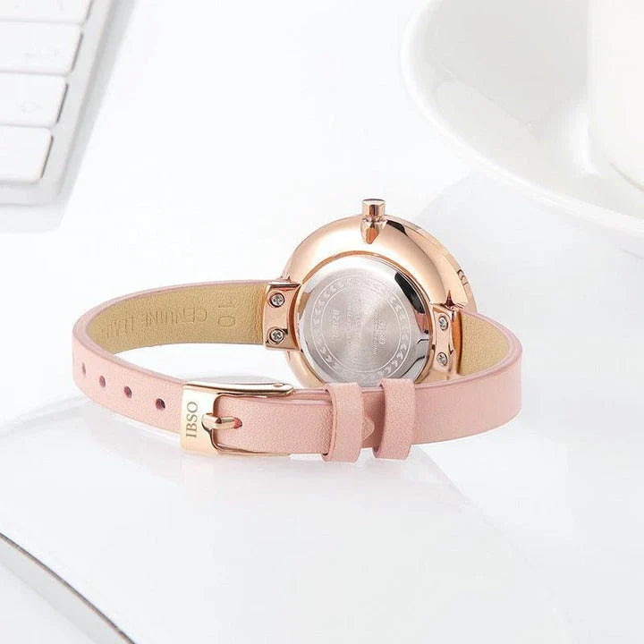 Stylish slim ladies' waterproof watch in various colours, including black, tan, grey, and white, with rose gold or silver accents.