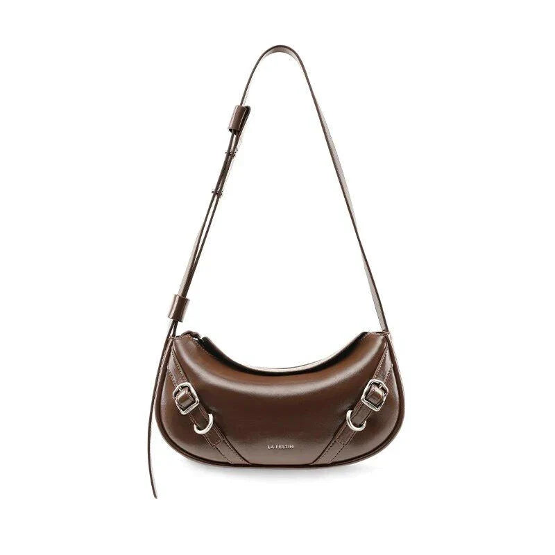 Elegant black shoulder and crossbody baguette bag made with premium split leather and synthetic lining