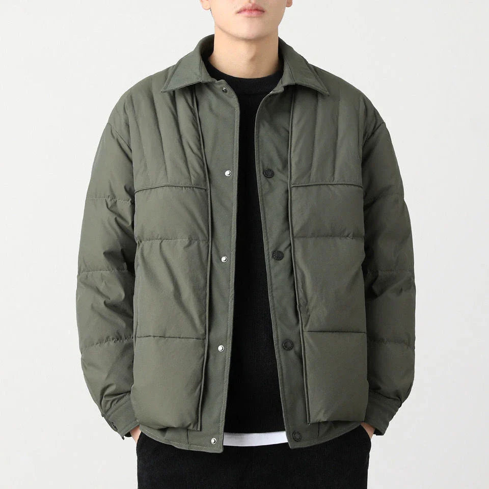 A premium lightweight down jacket in a sleek, tailored design for the stylish British gentleman