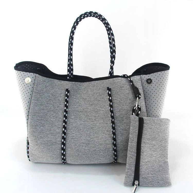 A neoprene beach bag in a stylish design, perfect for British summer adventures at the coast