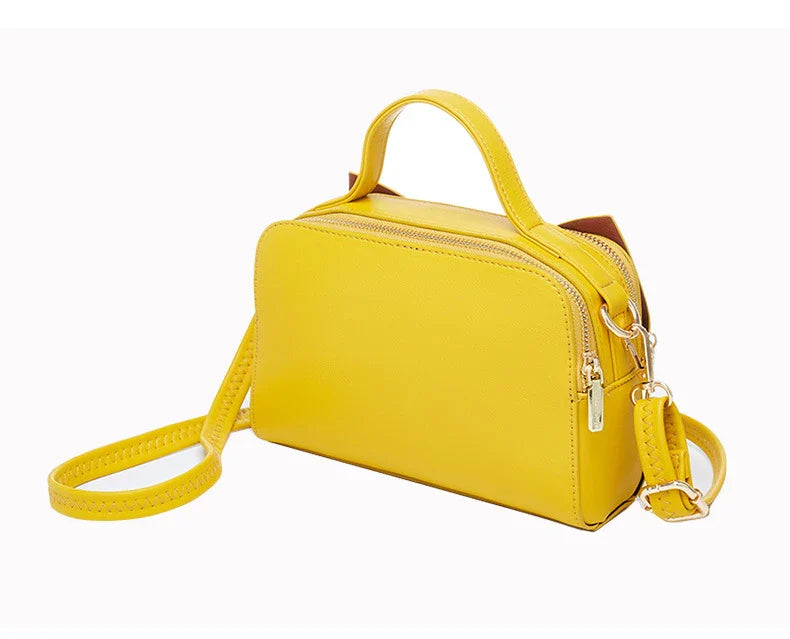 Elegant brown Korean-inspired bow shoulder bag with adjustable strap and roomy interior