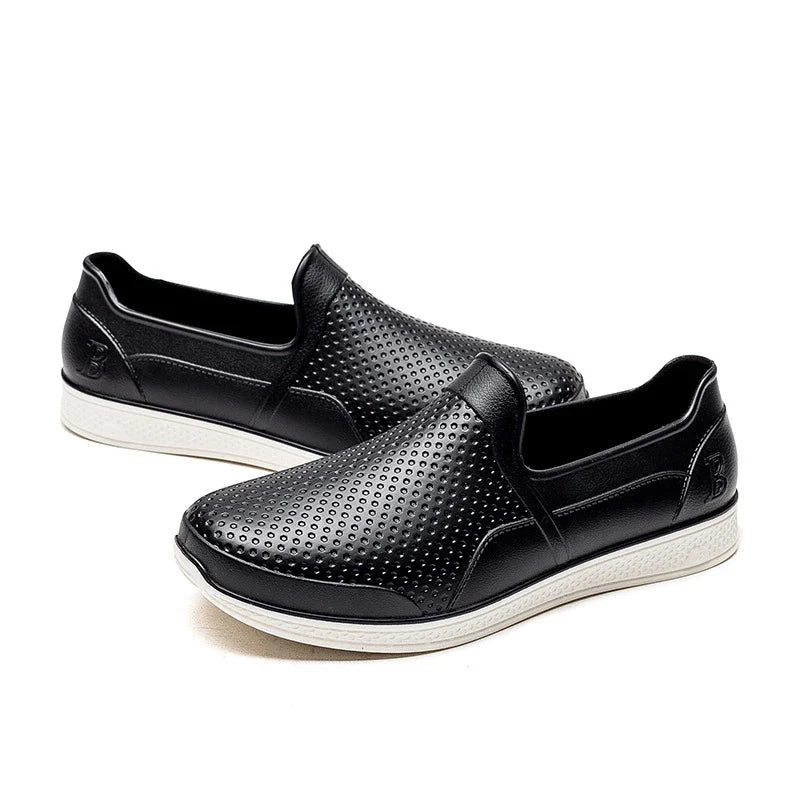 Stylish waterproof rain boots for men, featuring a unique design and durable construction for comfortable wear in wet weather.