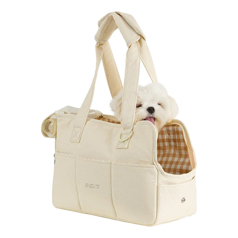 Portable One-Shoulder Pet Carrier Bag made of soft, breathable cotton for comfortable pet travel in the UK