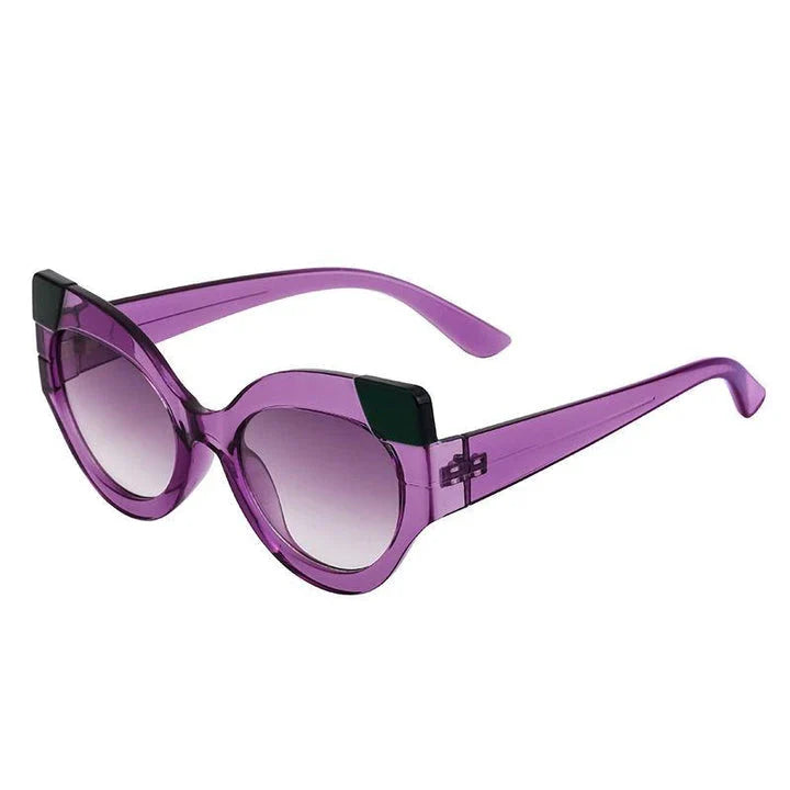 Iconic Cat Eye Retro Punk Sunglasses in black and gray, offering vintage charm and modern edge with UV400 protection