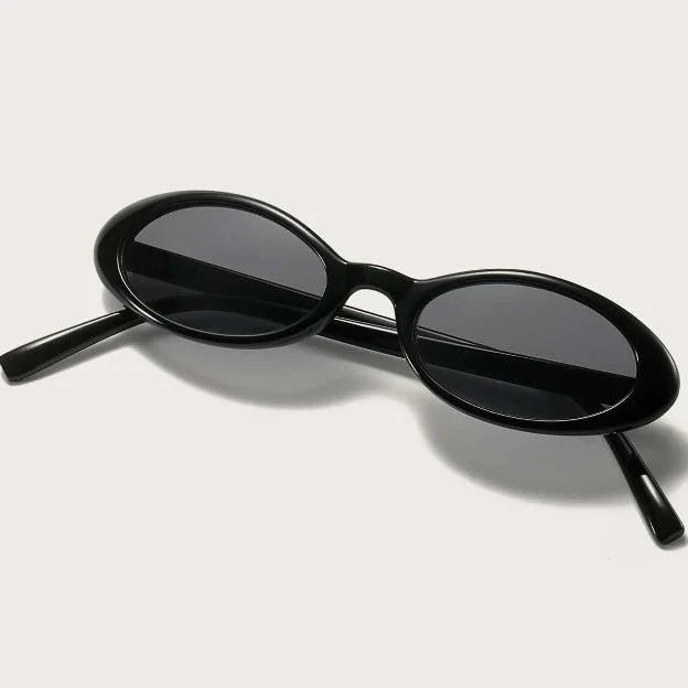 Stylish retro oval sunglasses for fashionable women with UV protection and photochromic lenses