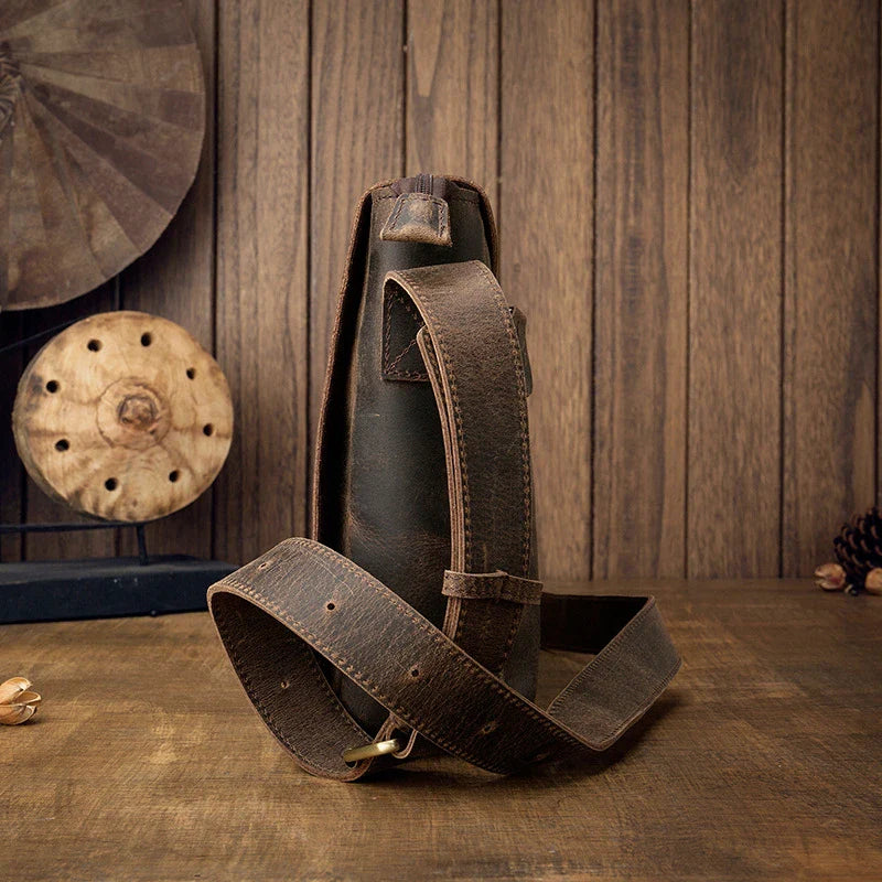 A retro-inspired leather shoulder bag for men, featuring a classic British design and high-quality construction