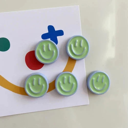 Cheerful Nordic-inspired refrigerator magnets with cartoon designs in various colours, made of high-quality resin for durability