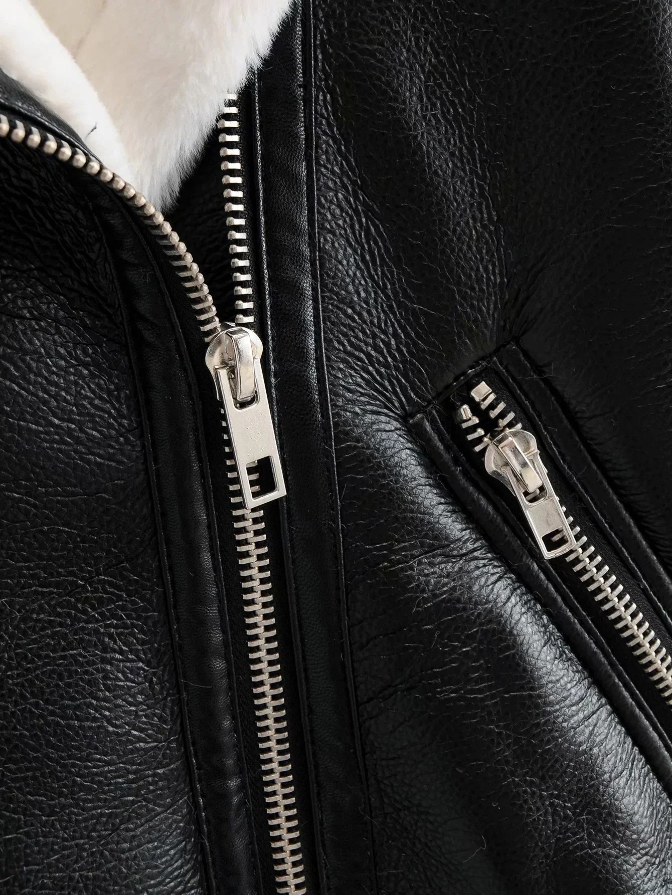 Warm faux leather jacket with plush faux fur lining, available in classic British colours for autumn and winter wear.