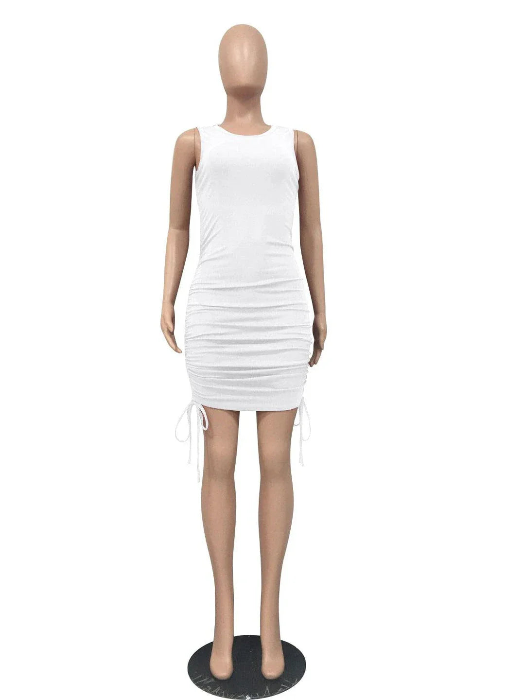 A stylish pleated dress with a drawstring waist, featuring a round neckline and conventional sleeves for a chic British fashion look.